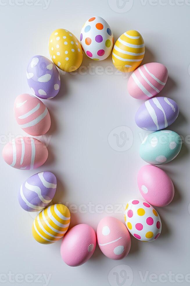 Pastel decorated easter eggs in oval flatlay on white background with graphic patterns showcasing festive spring holiday concept and modern colorful seasonal design style photo