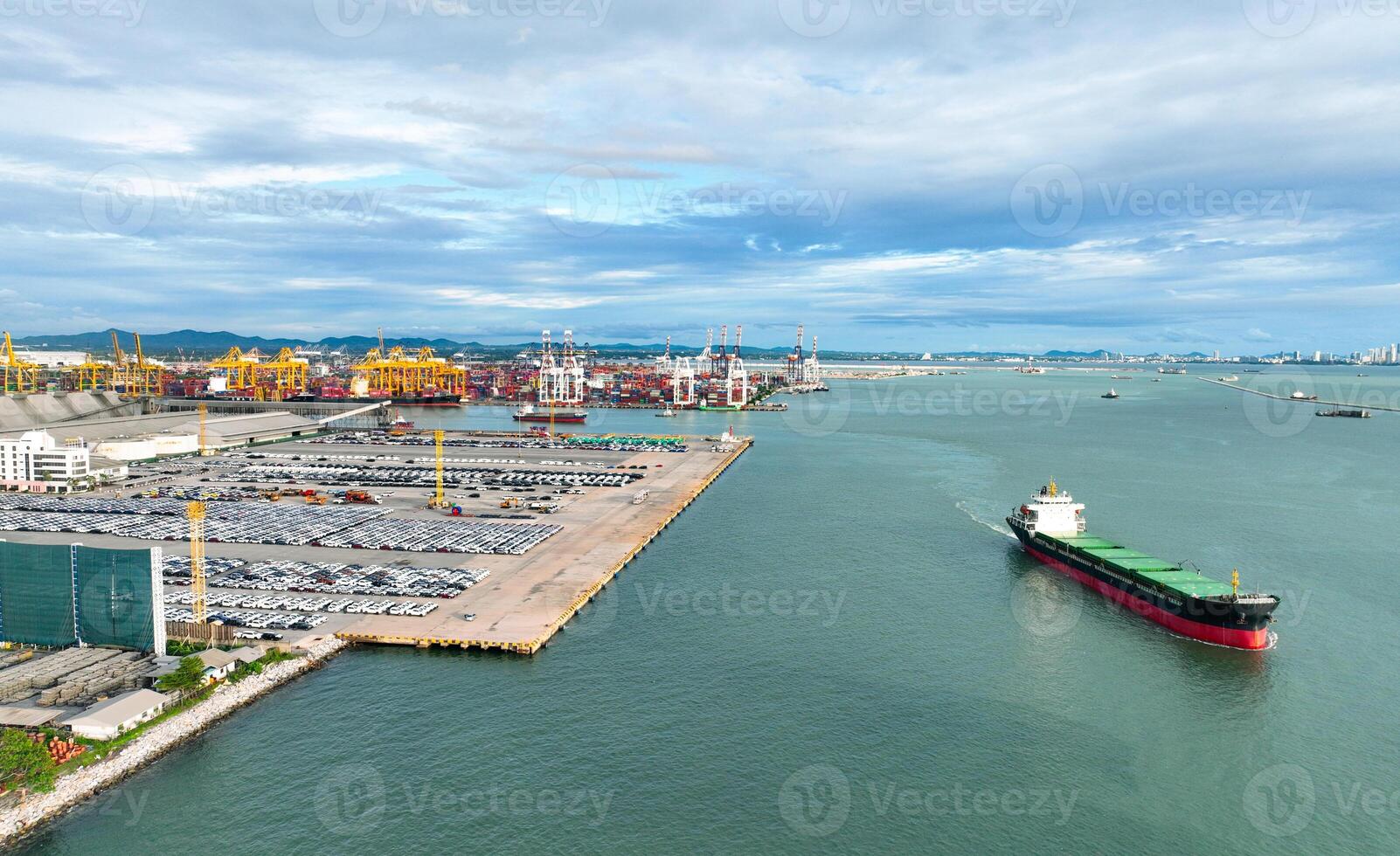 Rows of brand-new automobiles at a shipping port, awaiting transport for global trade. Industrial infrastructure, cargo containers, and supply chain logistics. Automotive export industry in action. photo