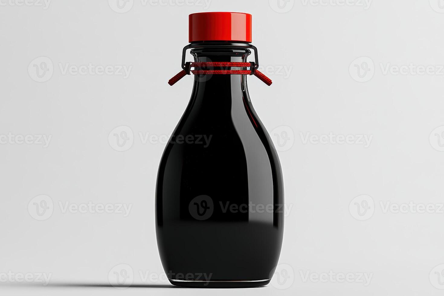 Unique black bottle with red cap displayed on a simple background photo