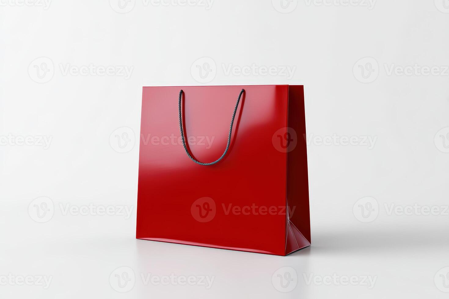 Vibrant red shopping bag displayed on a neutral background photo