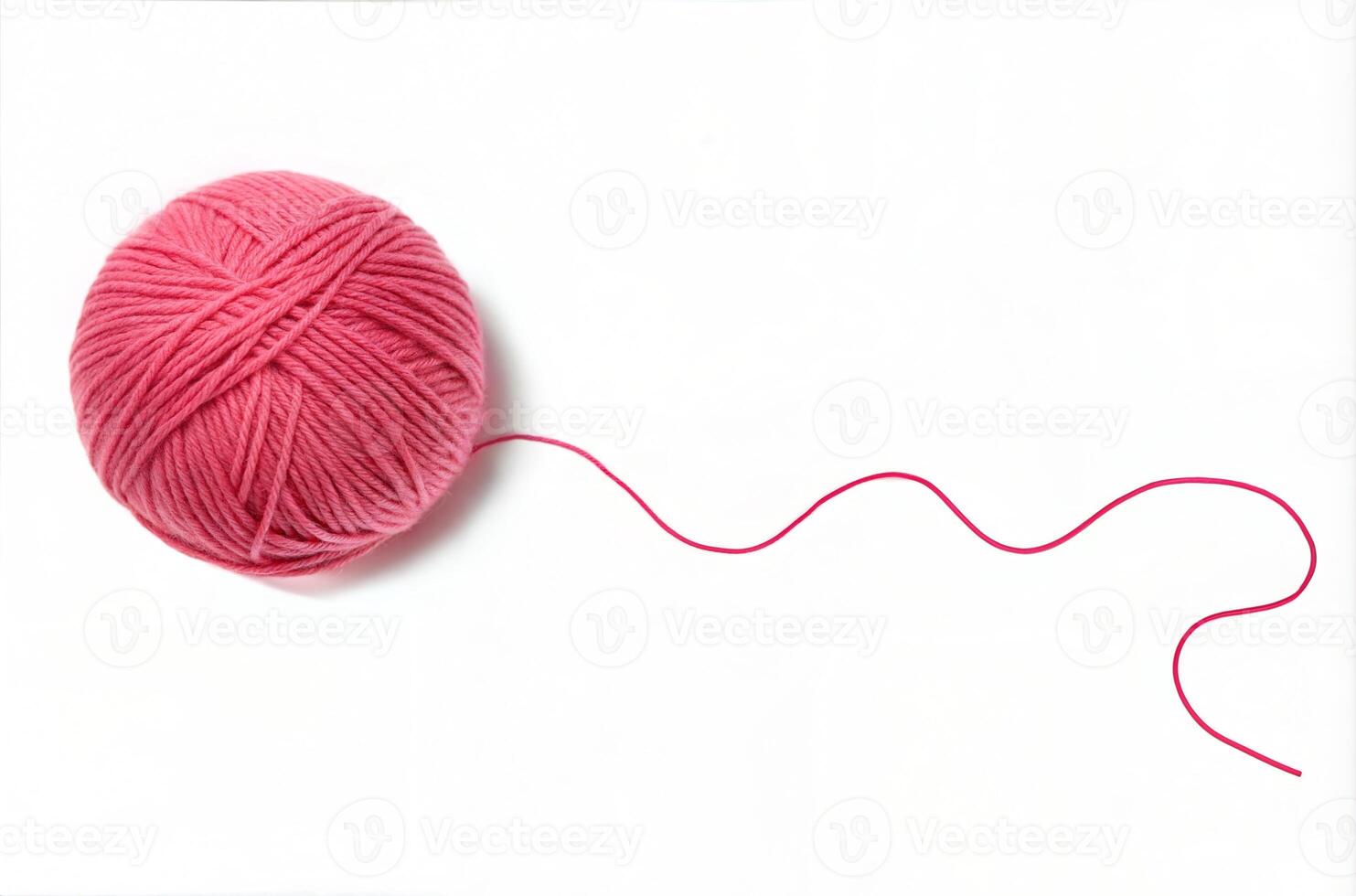 Soft Textured Pink Yarn Ball with Long Thin Thread Line photo