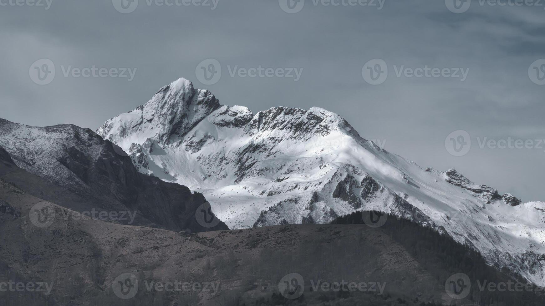 Landscape with snow mountains in the background photo
