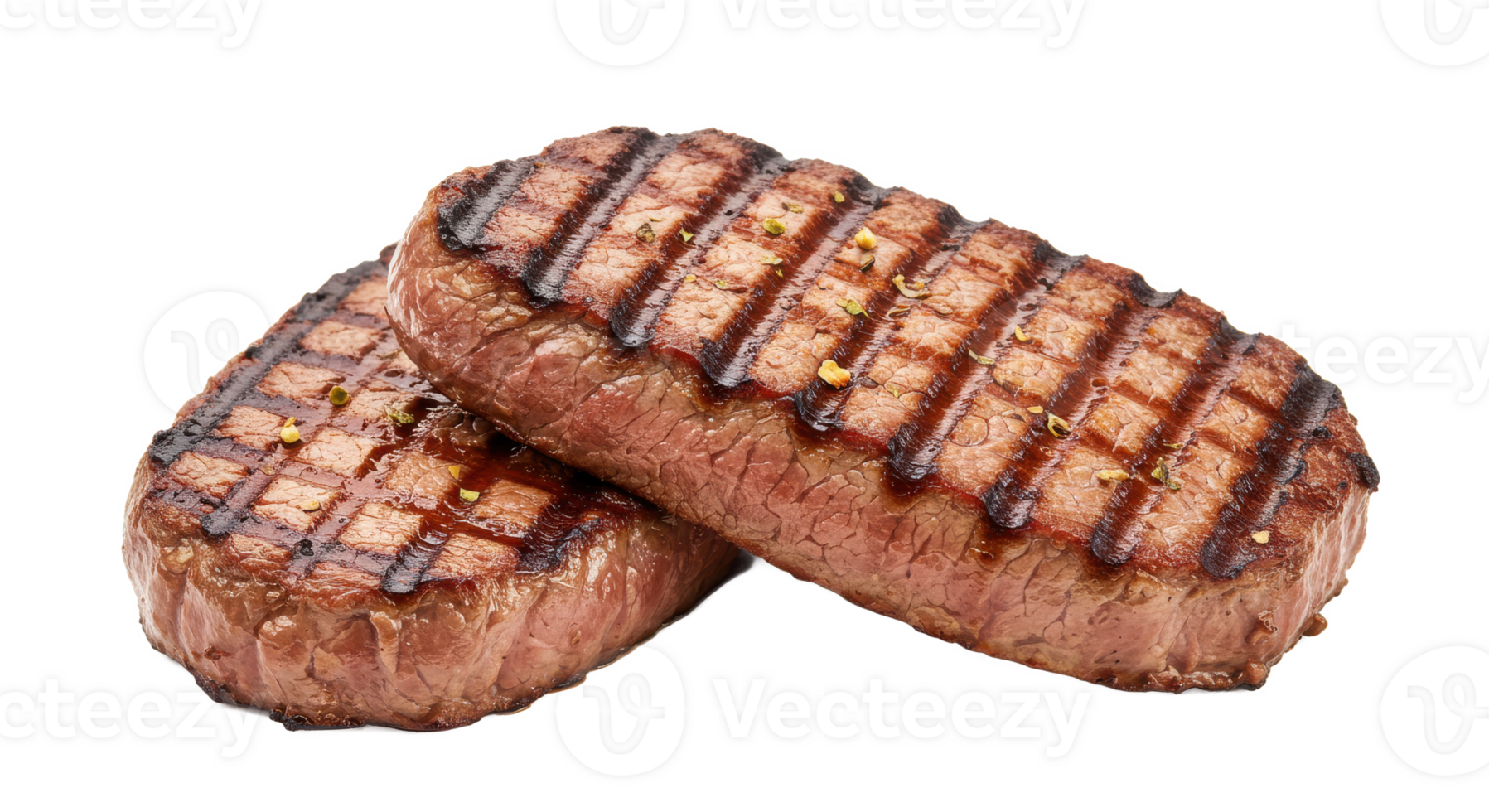 Two grilled steaks stacked on each other showing grill marks and seasoning png