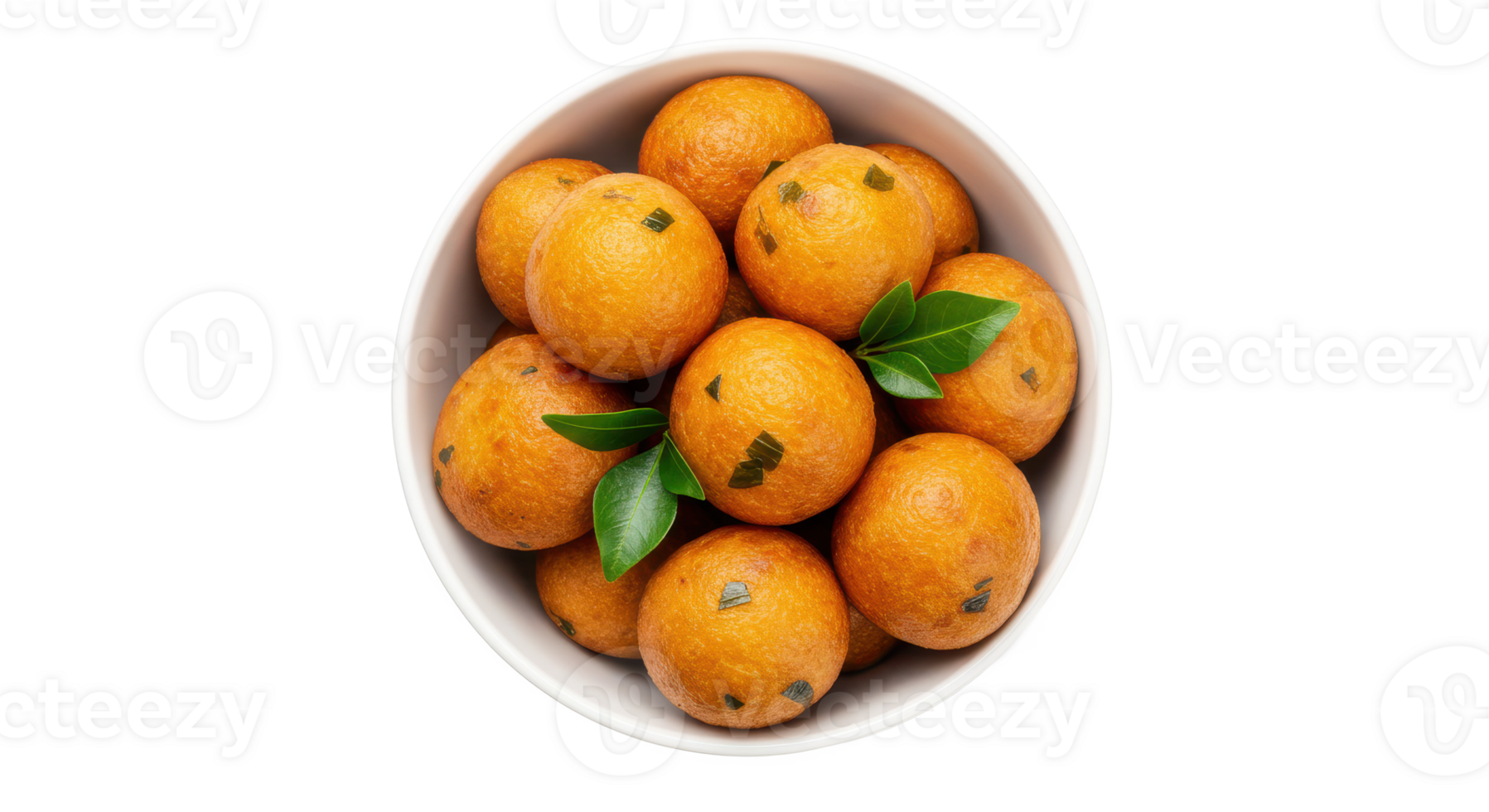 Overhead view of a white bowl filled with orange balls decorated with green leaves and small dark spots png