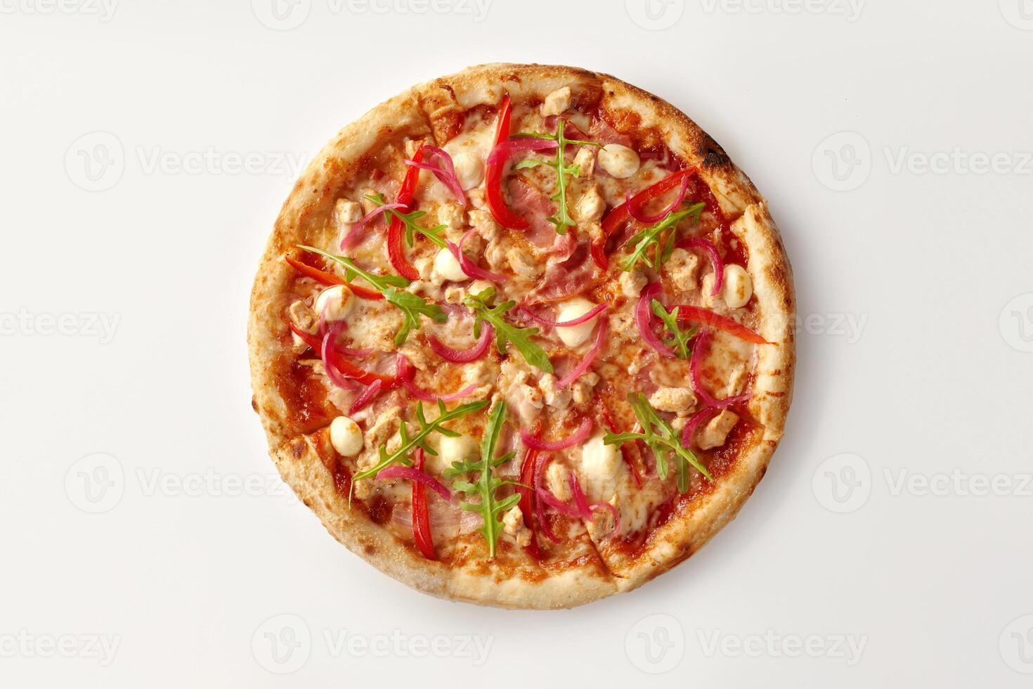 Delicious pizza with chicken, red onion, arugula, and mozzarella on white background photo