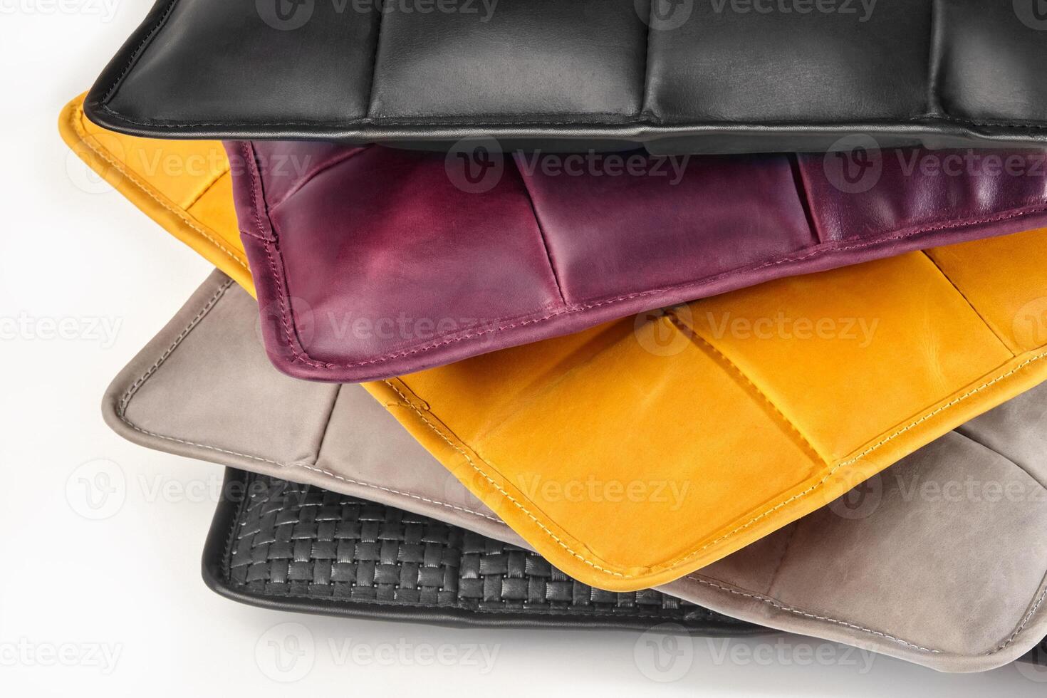Stack of colorful leather pillows showing exquisite craftsmanship photo