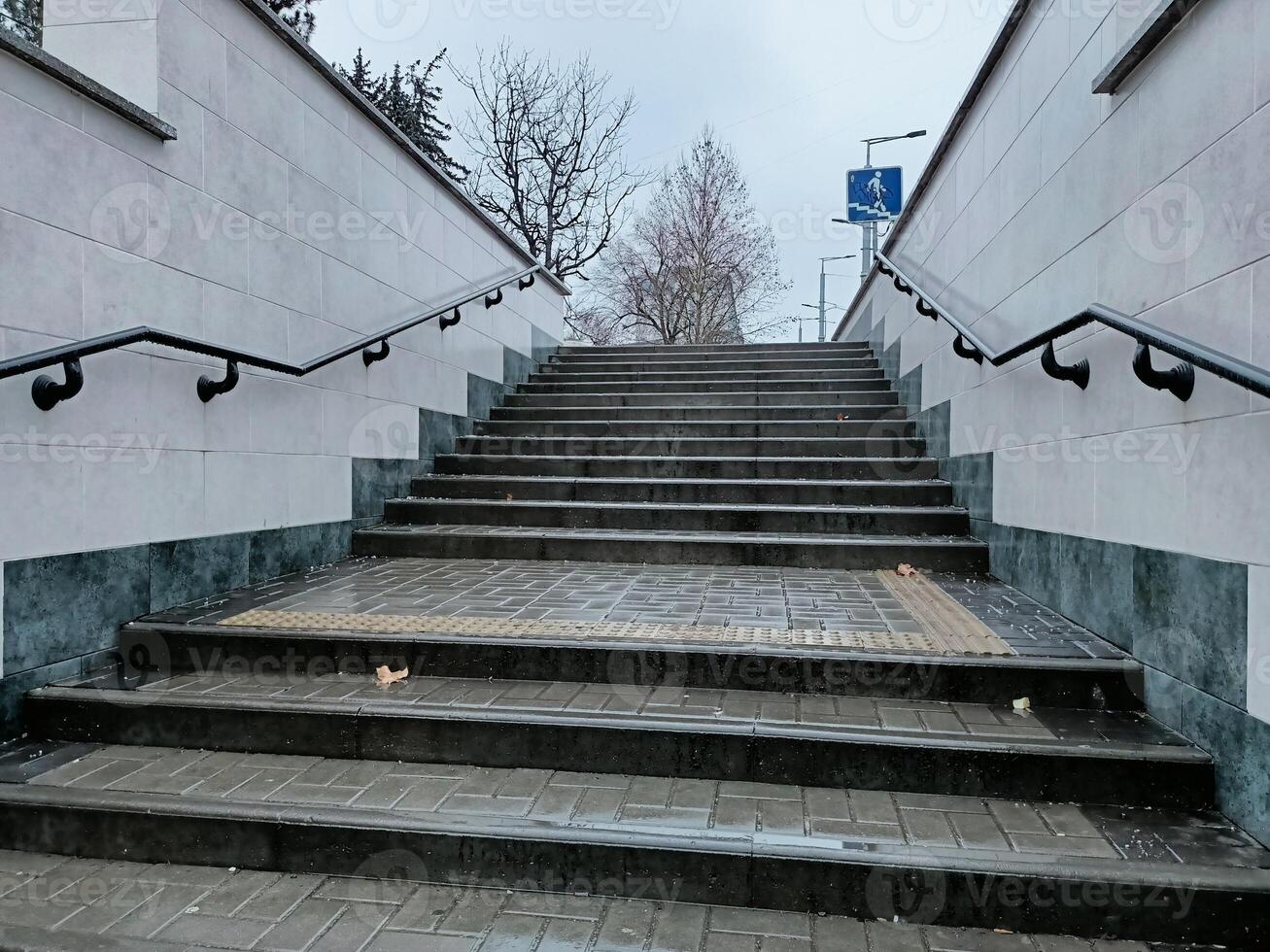 Staircase in the Urban Environment Featuring Handrails for Enhanced Accessibility and Safety photo