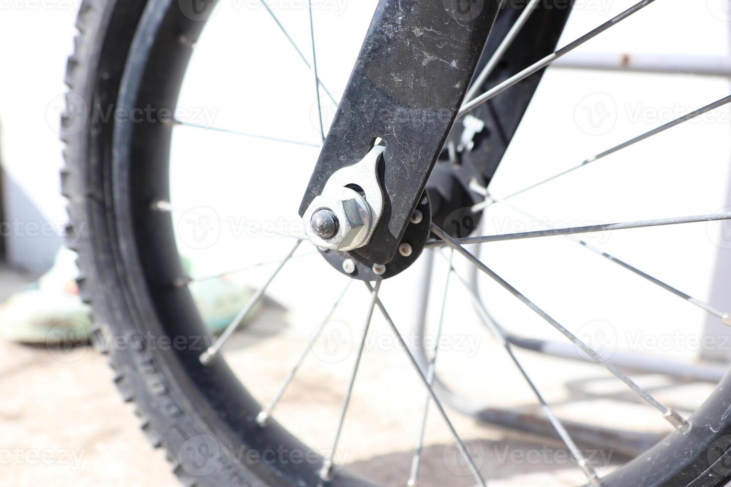 A CloseUp View of a Bicycle Wheel Hub and Its Spokes, Capturing Every Detail Clearly photo