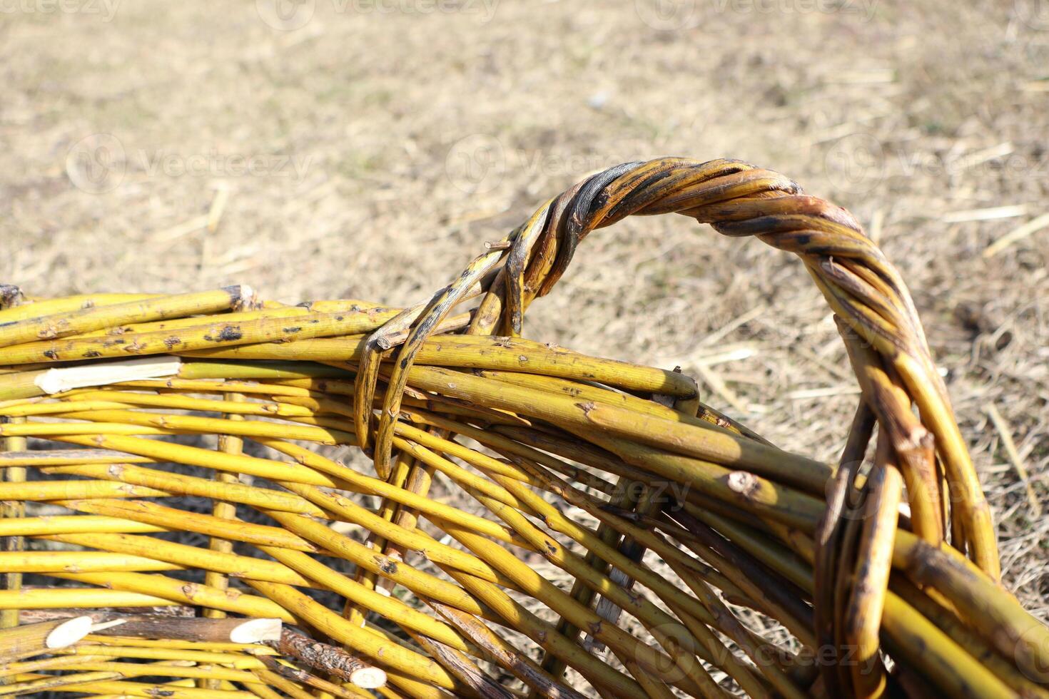 This is a beautifully woven basket featuring a natural texture and warm, inviting tones photo