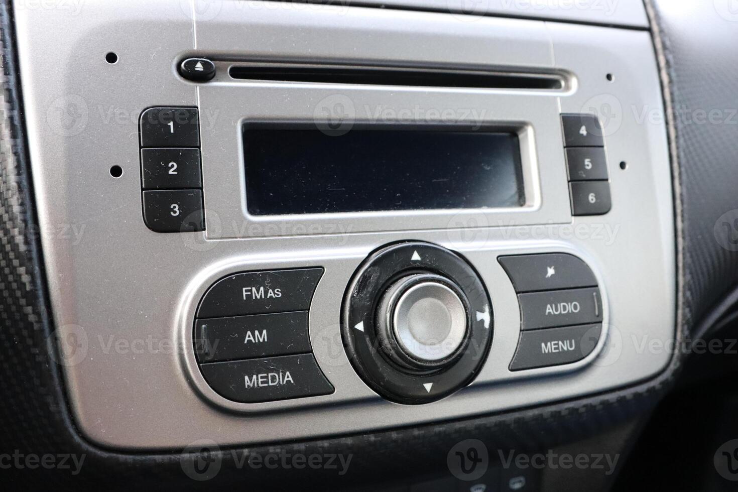 The modern car audio control panel showcases an impressive array of features and technology photo