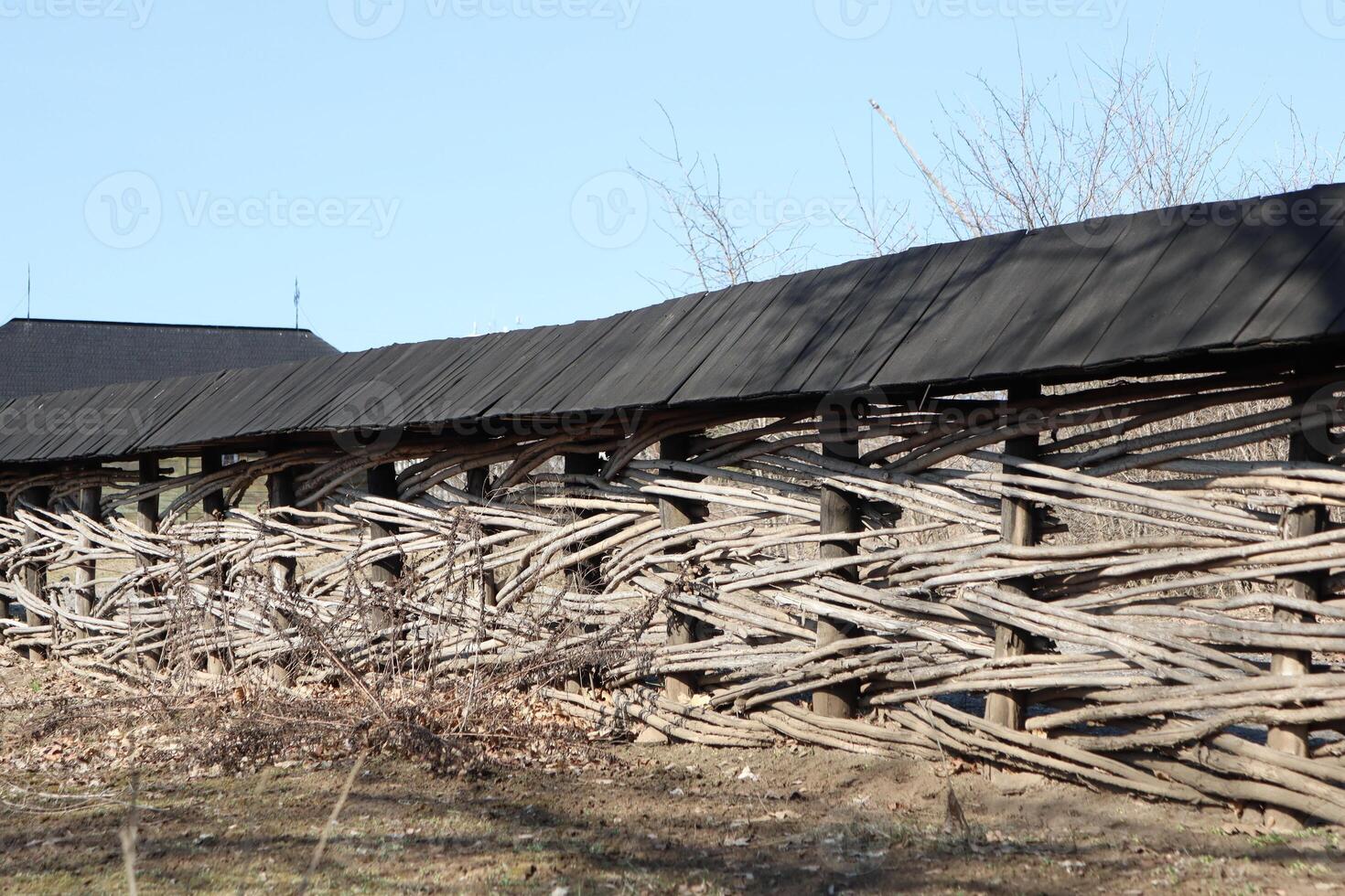 A Rustic Wooden Structure Intertwined with Natures Beauty and Serenity in the Outdoors photo