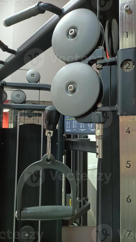 A CloseUp of a Gym Cable Machine used for Effective Strength Training Exercises and Workouts photo