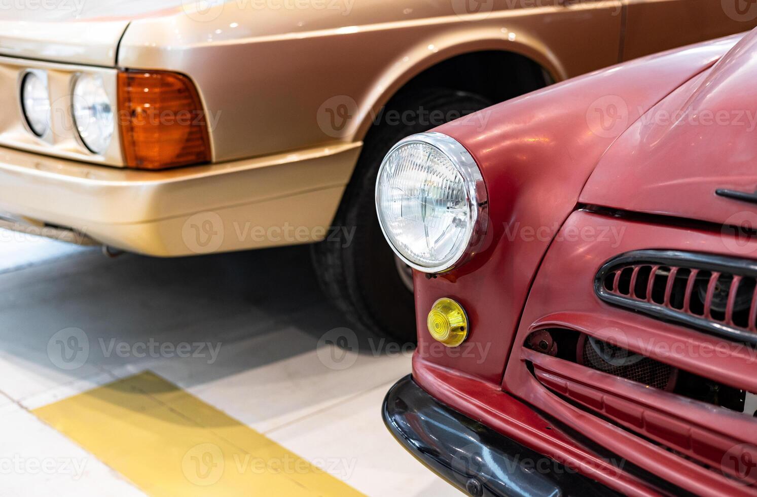 Old cars in a garage photo