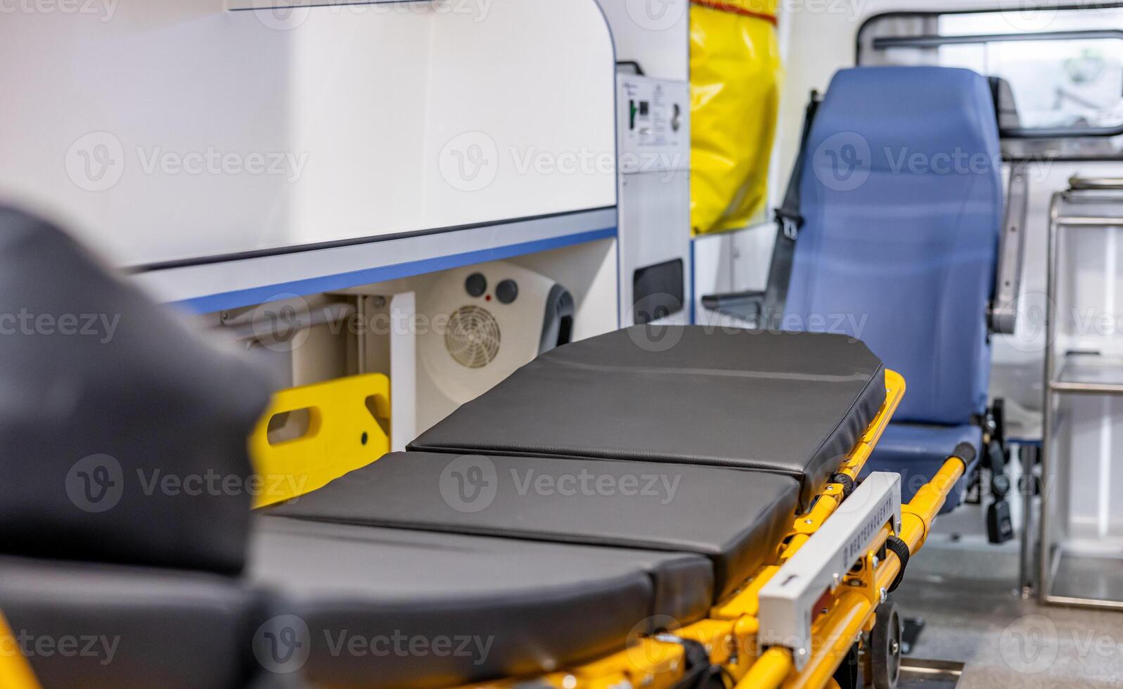 A hospital bed in a medical vehicle photo