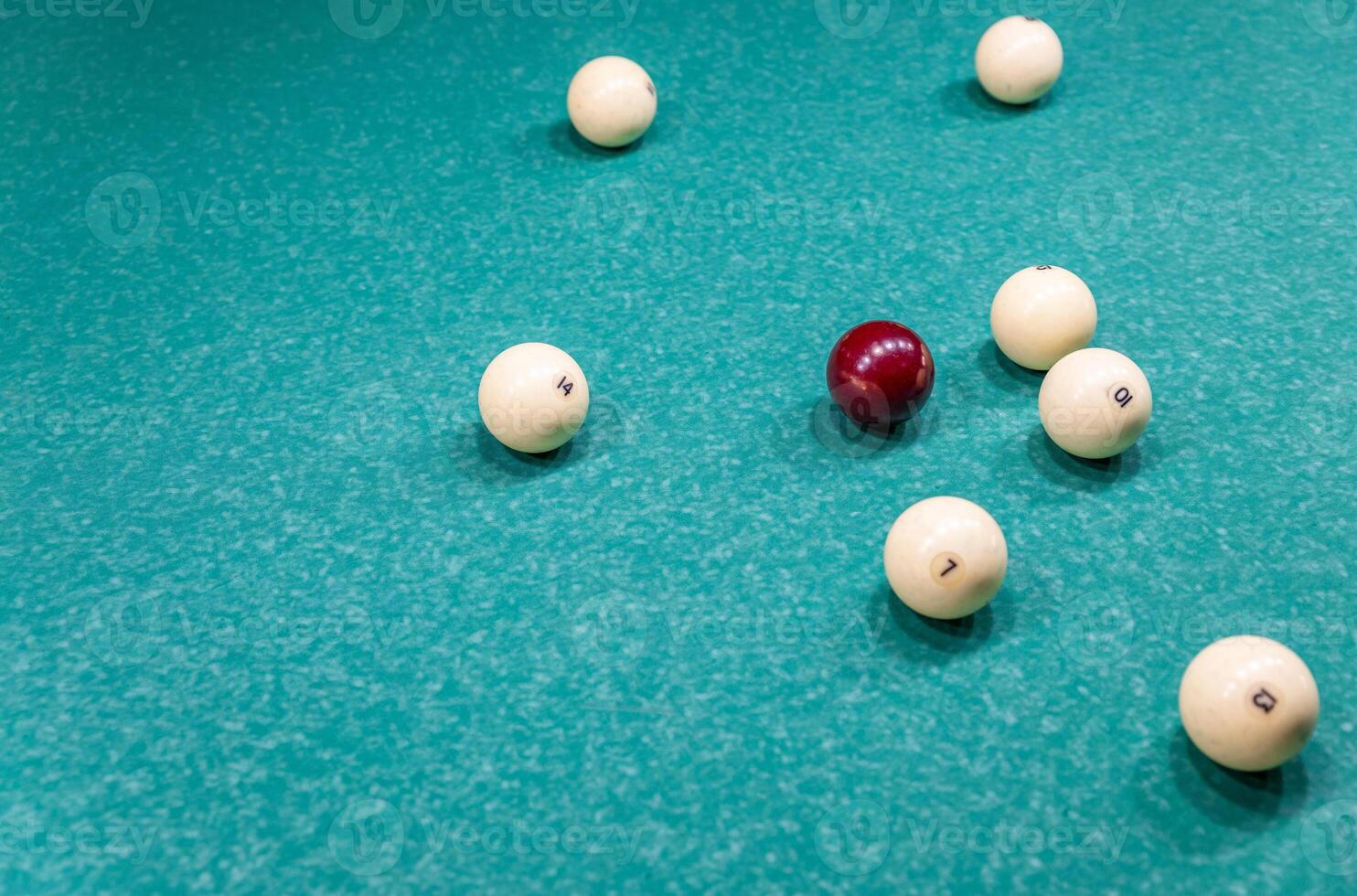 Billiards balls on a green table photo