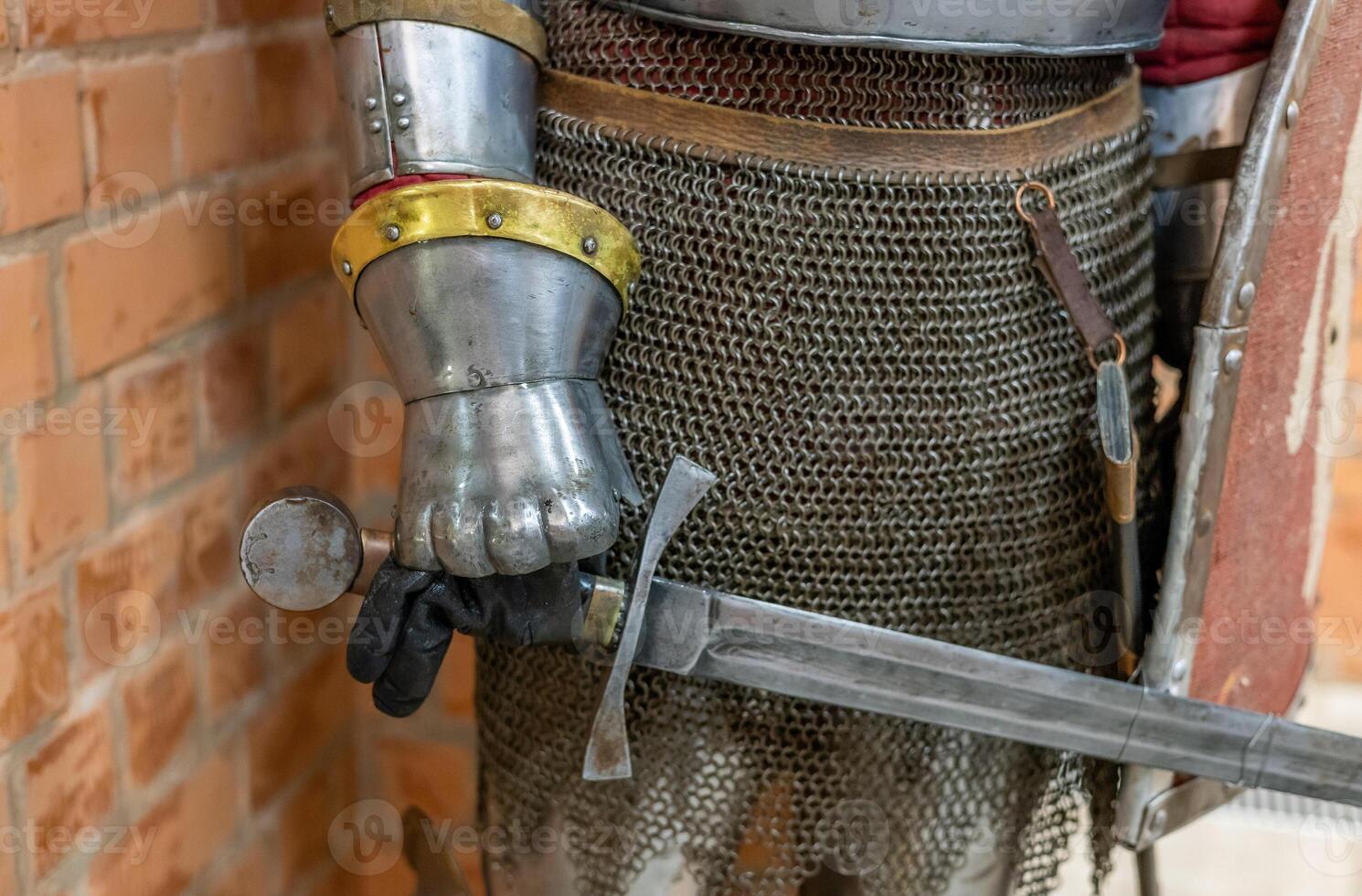 A medieval knight holding a sword and shield photo