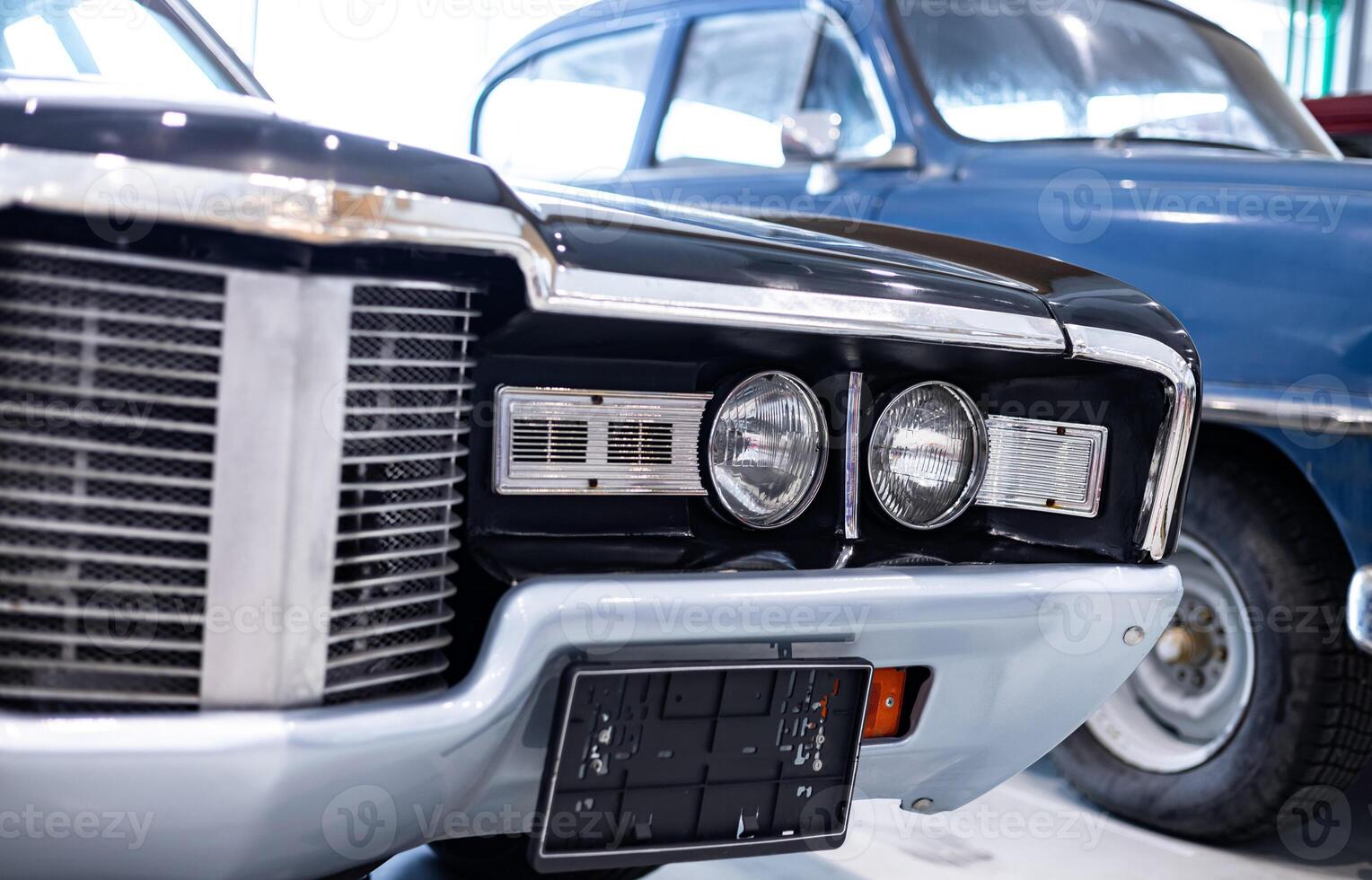 A close up of the front grille of an old car photo