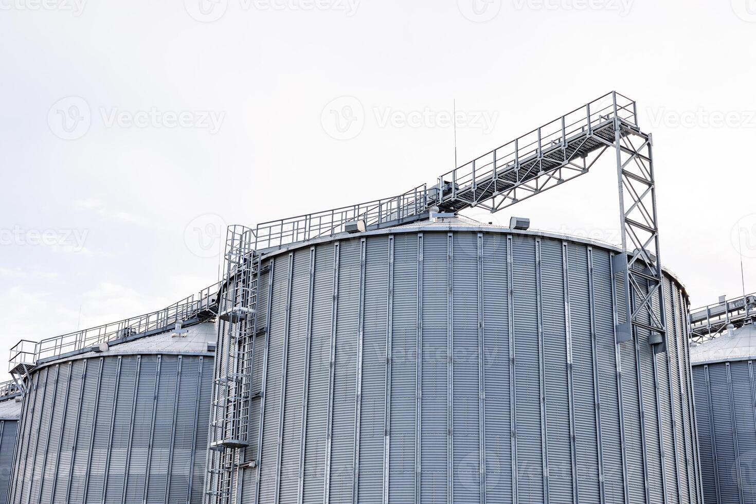 Grain silos in the field photo