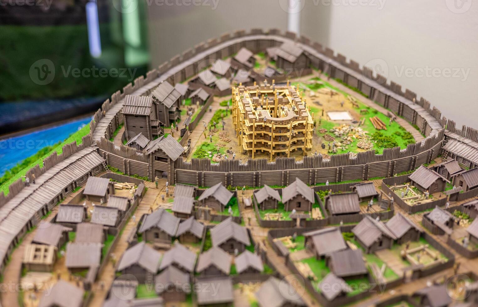 A model of a medieval city with a castle in the middle photo