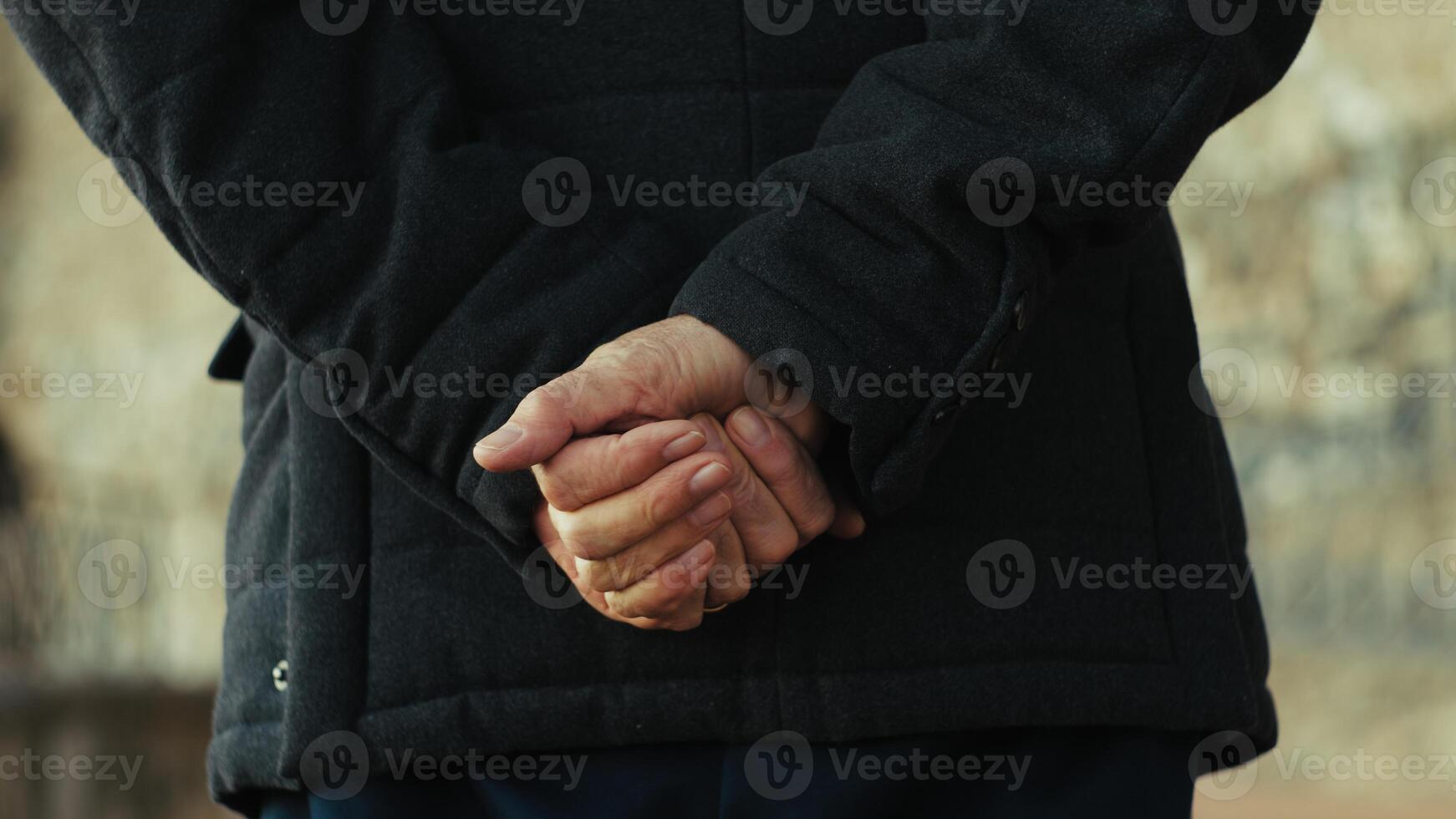 Hand Of An Elderly Country Gentleman Moves In Silhouette In The Village Close up photo