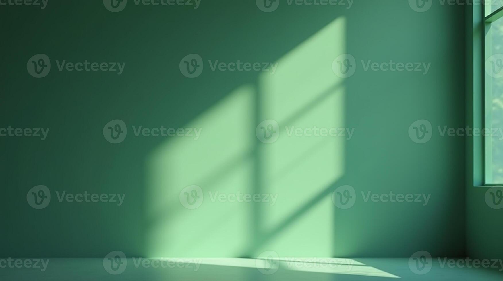 Sunlight casts geometric shadows on a serene, green wall. photo