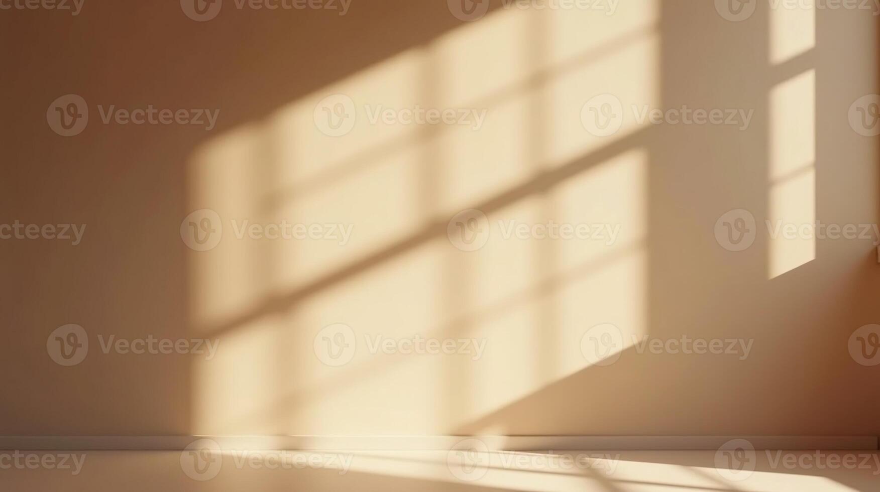 A serene, minimalist scene of sunlight filtering through a window, casting intricate shadows on a smooth, beige wall. photo