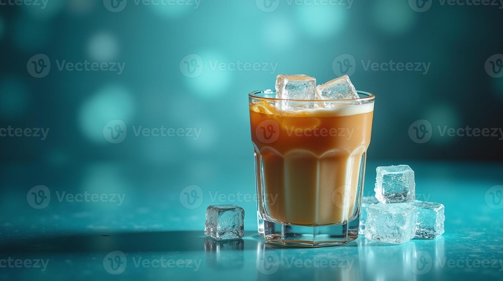 Iced coffee beverage in a clear glass with ice cubes. photo