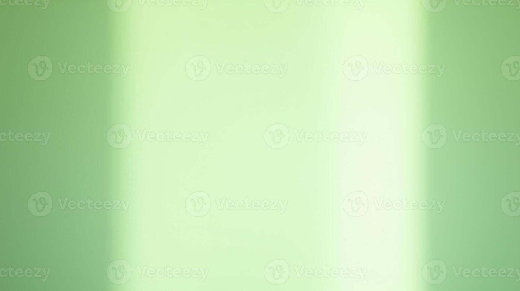 A gradient of soft, pastel greens fills the frame. photo