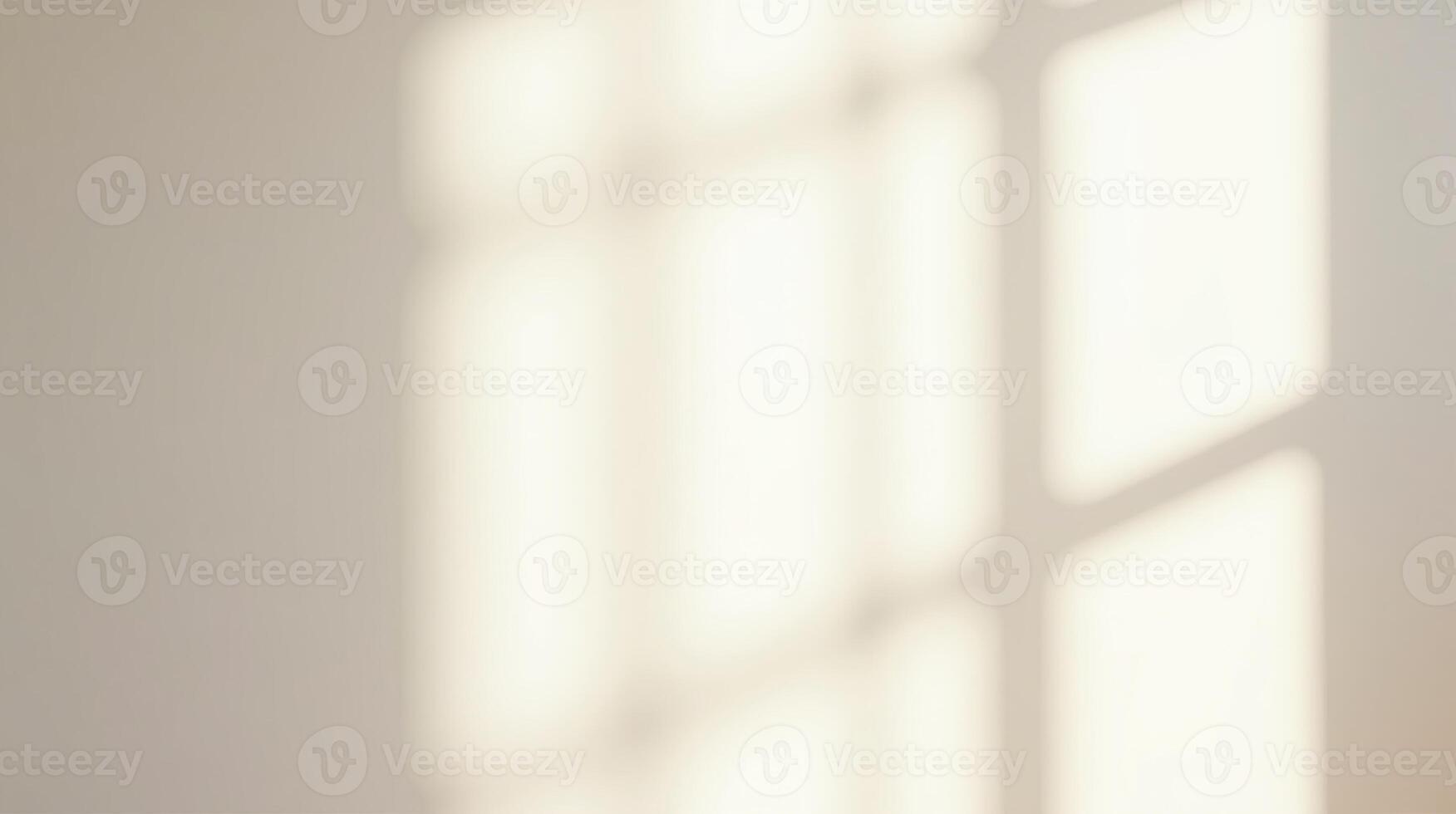 Sunlit window shadows on a pristine wall. photo