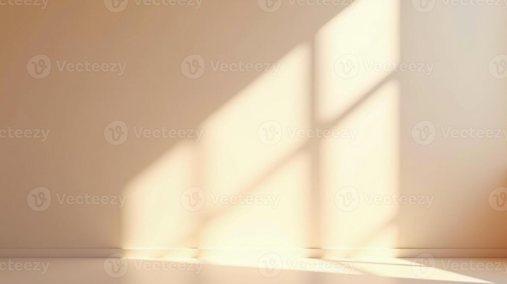 Illuminated shadows on an empty, beige wall. photo