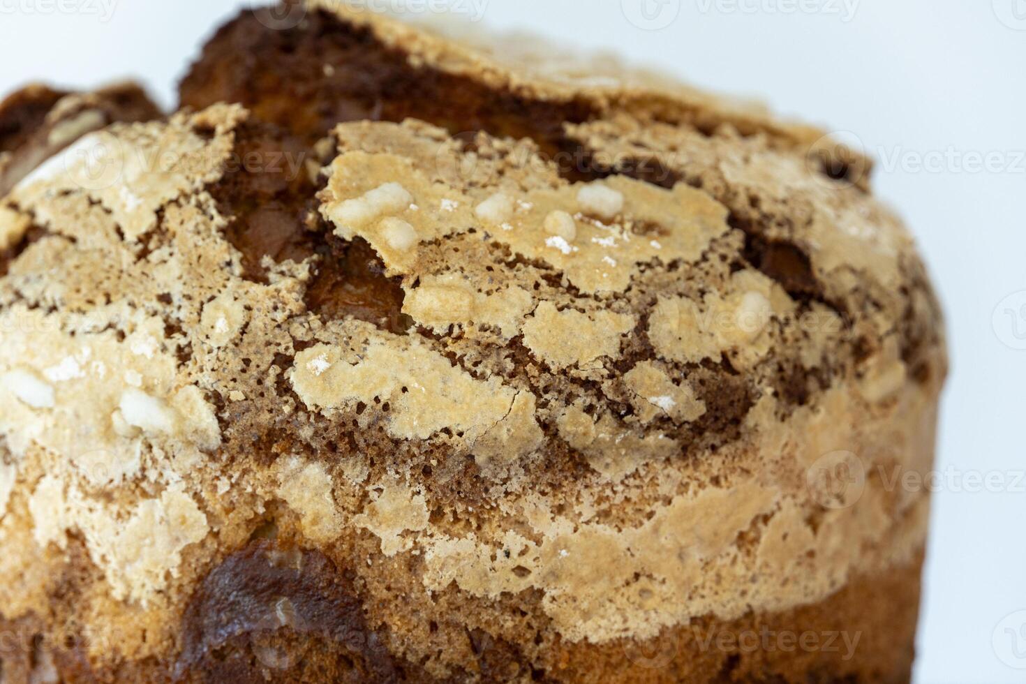 Cake top view, panettone delicious bakery close up crust showing detailed texture and cracks photo