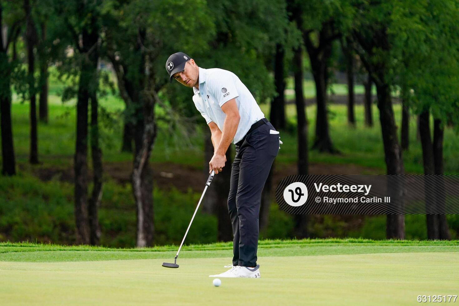 Jordan Spieth putts on the ninth green during the second round of the