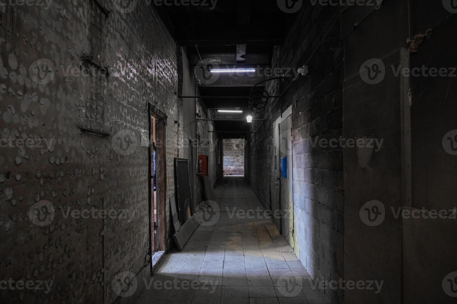 Moscow, Russia, 14.07.2025 Long dirty corridor with open doors photo