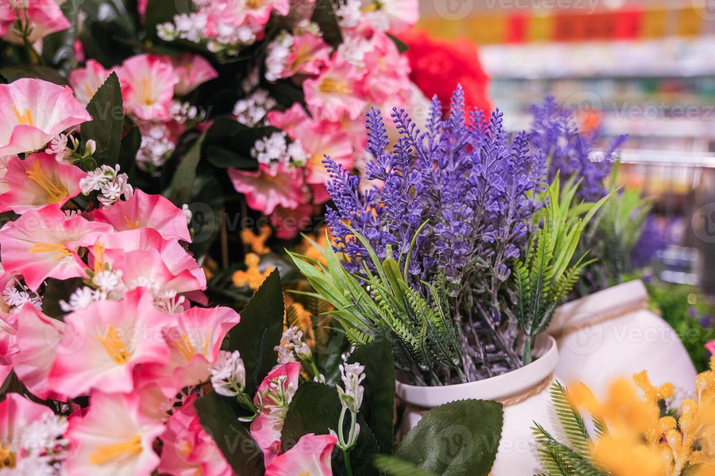 Moscow, Russia, 14.07.2025 Various artificial flowers on store sheet photo