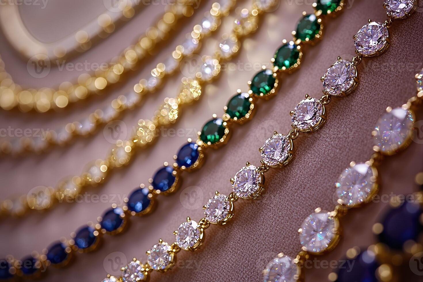 Gold chains sparkling with diamonds, emeralds, and sapphires create a luxurious display photo