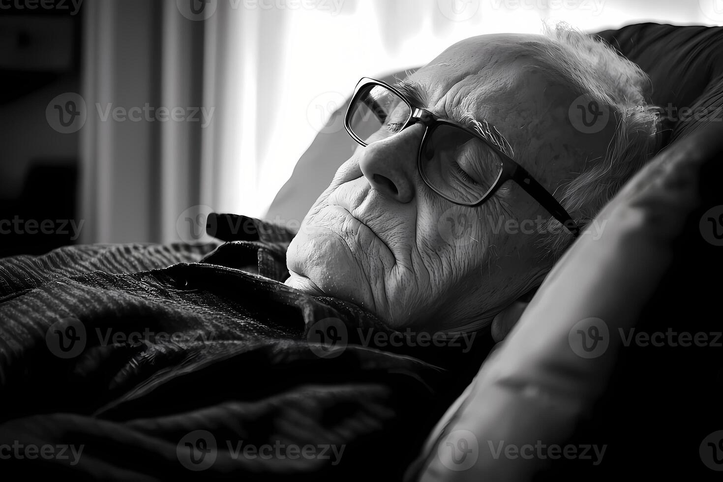 Elderly man sleeping peacefully on couch, enjoying retirement nap photo