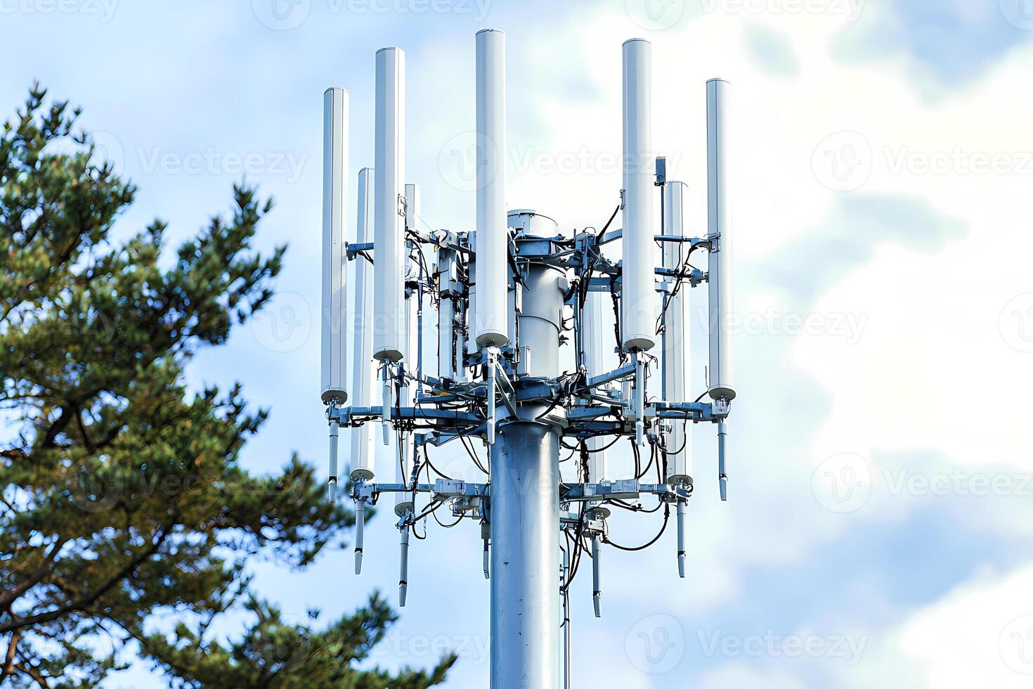 Telecommunication tower providing wireless network coverage on cloudy day photo