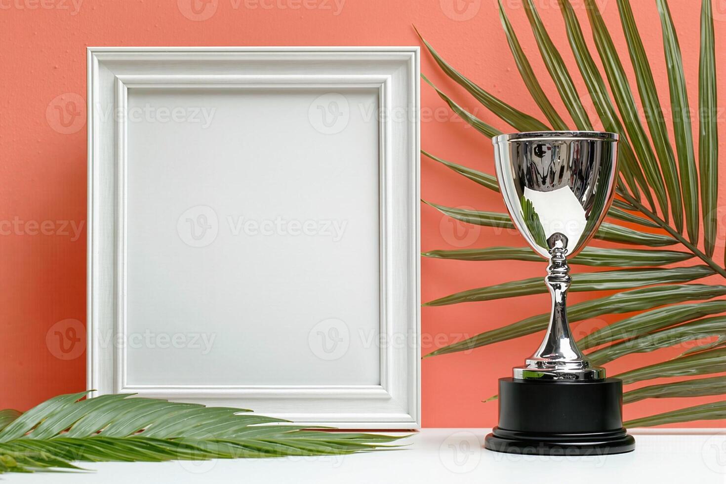 Silver trophy and white frame representing winning and achievement photo