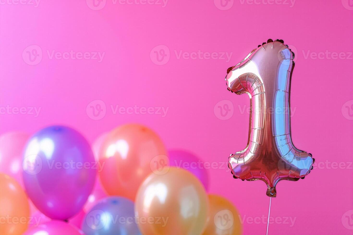 Silver number one balloon celebrating first birthday with colorful balloons on pink background photo