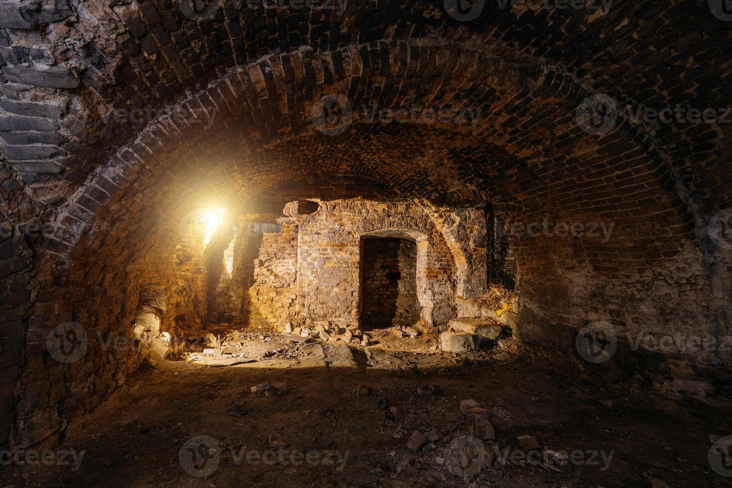 Dark and creepy vaulted red brick dungeon..... photo