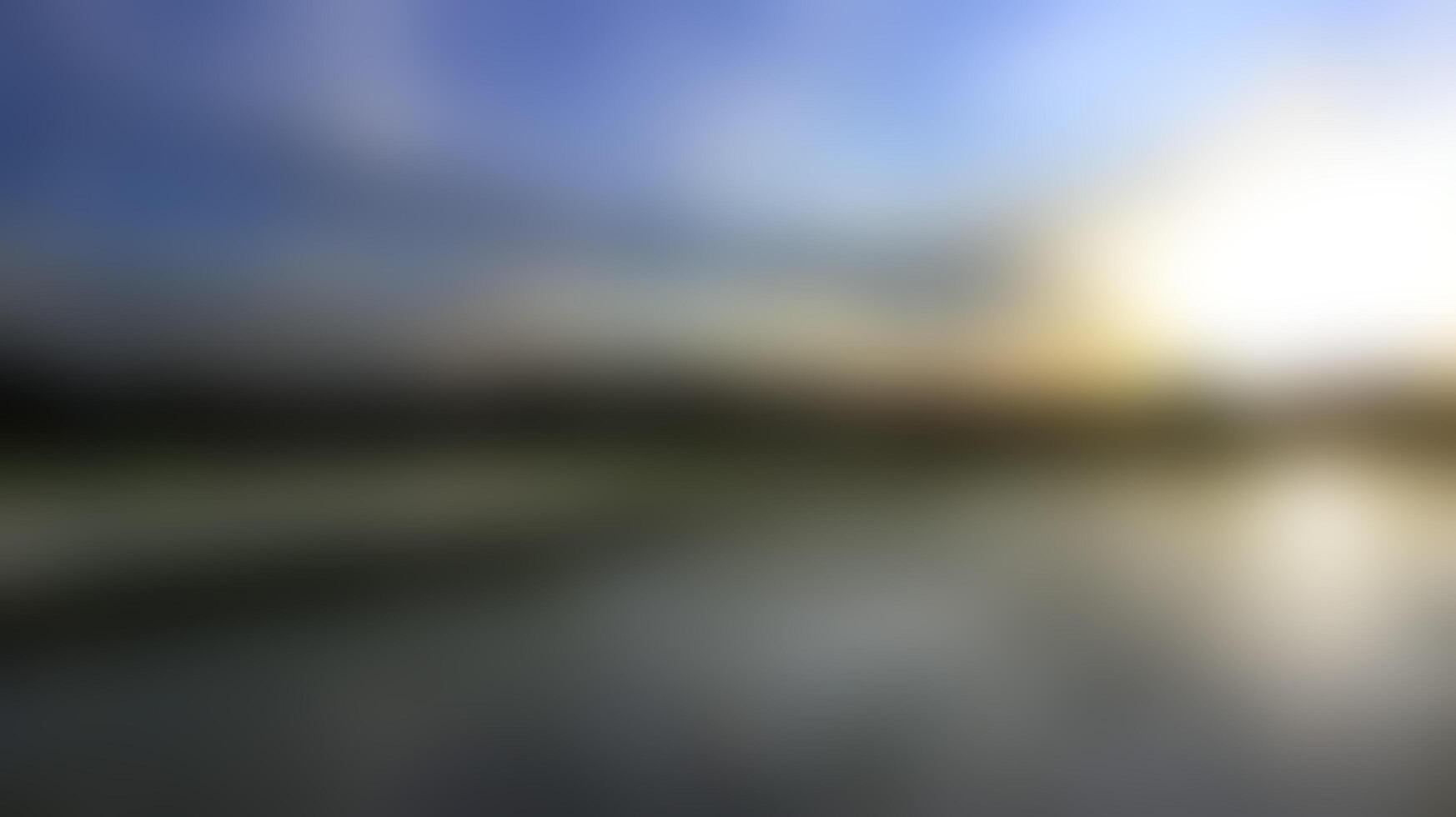 Abstract Sunrise Blurred Image with Water Reflection and Soft Light photo
