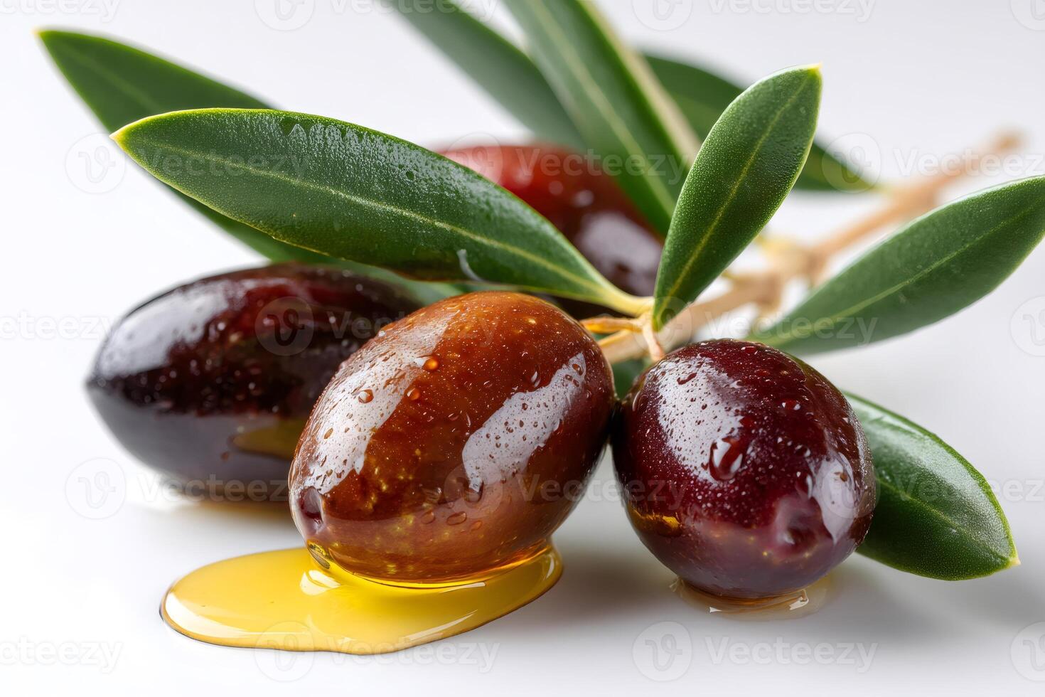 Olives dripping fresh olive oil with leaves on white background photo