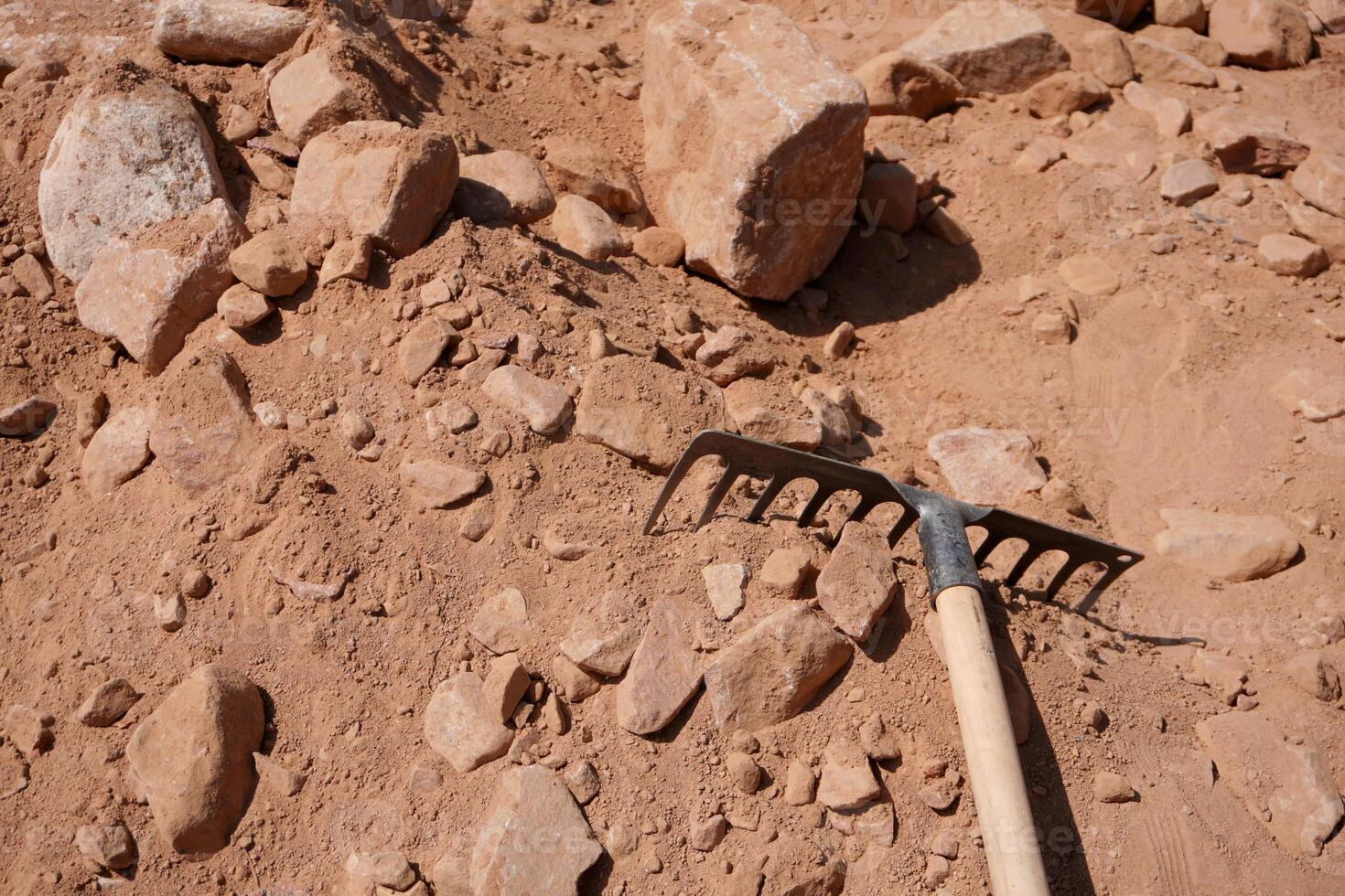Rake on Rocky Desert Terrain photo
