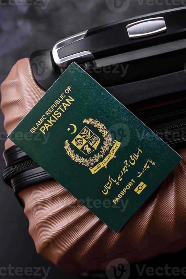 International passport of Pakistan on a suitcase photo