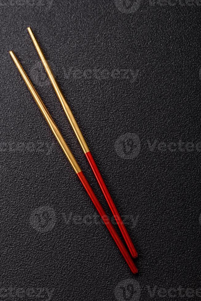 Chopstick Japanese or Chinese for eating sushi, rolls photo