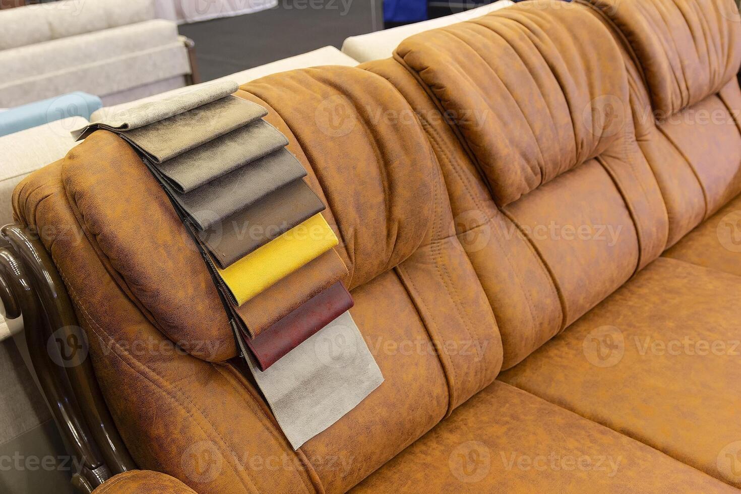 Samples of leather furniture upholstery in a furniture store photo