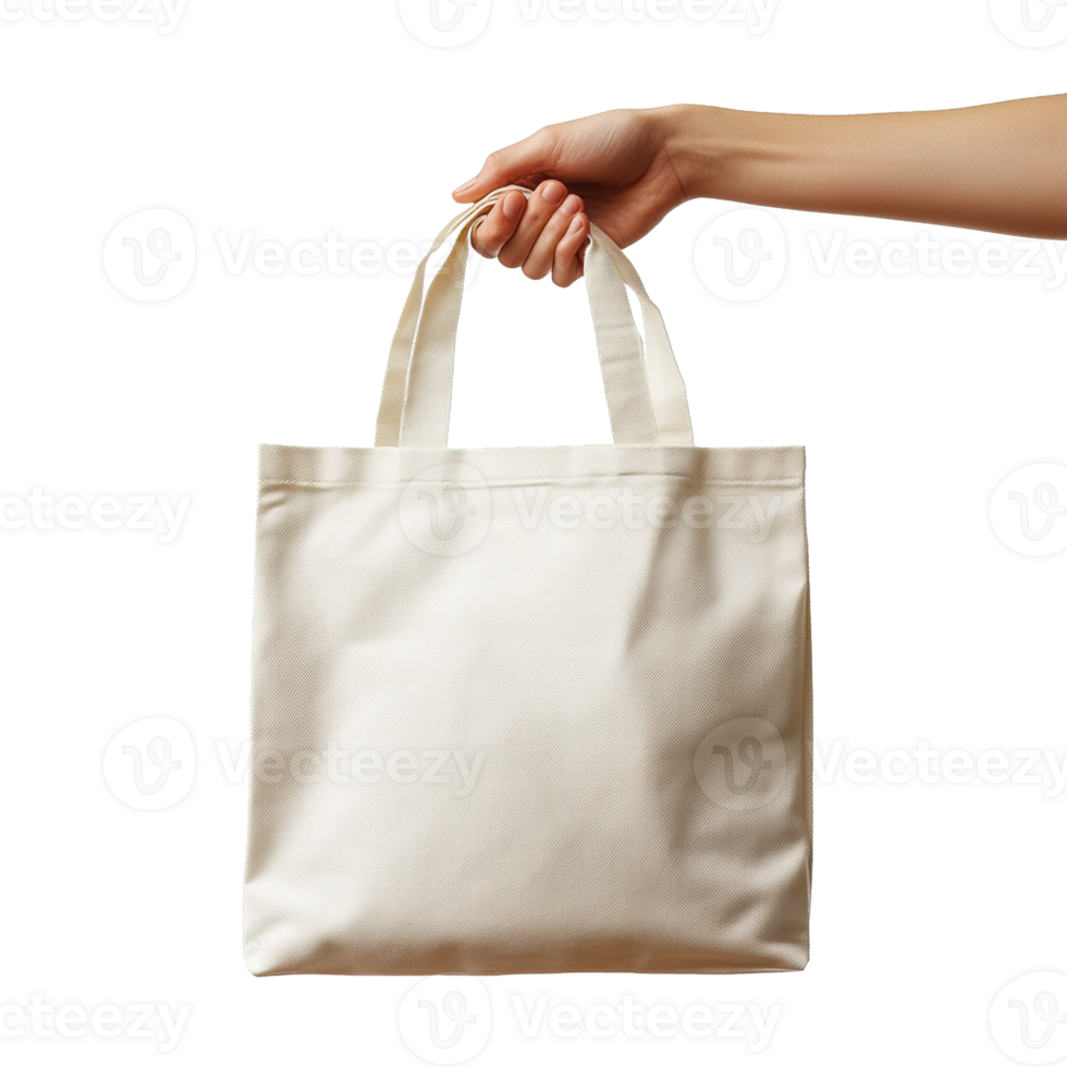 Close-Up of a Hand Holding a Plain Beige Canvas Tote Bag Against Transparent Background png