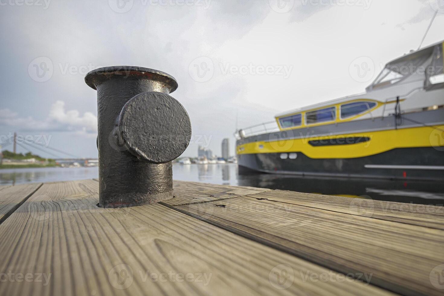 Luxurious modern yacht and wooden pier photo