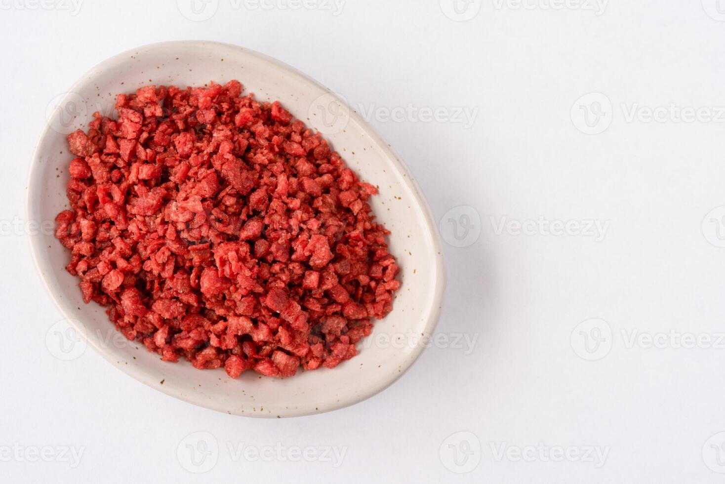 Dried Bacon Bits in an Oval Bowl photo