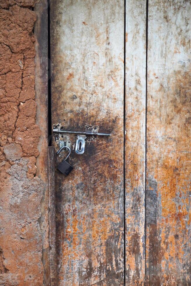Open Pad Lock on Rustic Door photo
